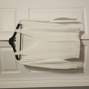 Cream/off-white sweater with cut outs